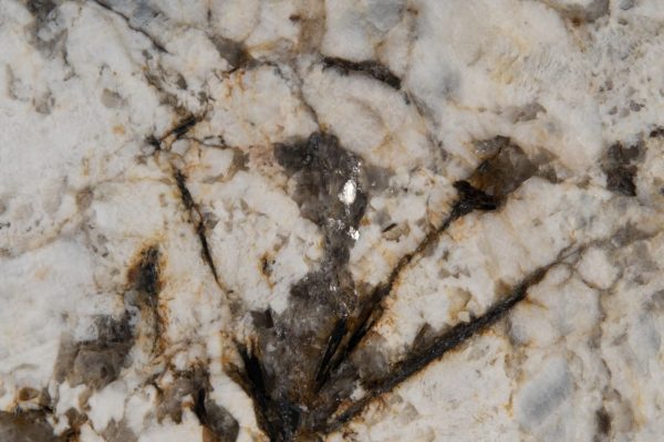 Antico Grey Granite countertop featuring grey, white, and warm golden-brown veining