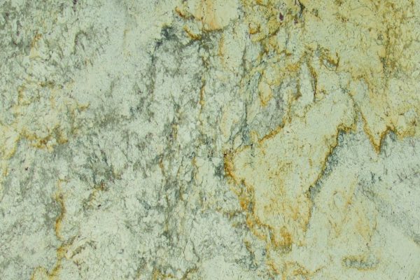 Aspen White Granite countertop featuring creamy whites, subtle greys, and warm gold highlights