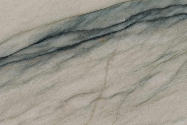 Audacia Quartzite countertop showcasing soft white, grey, and deep blue tones in unique patterns