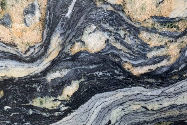 Azul Treasure Quartzite countertop showcasing bold patterns of deep blues, rich greys, and gold accents