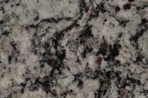 Bianco Frost Granite countertop featuring cool whites, soft greys, and subtle black flecks