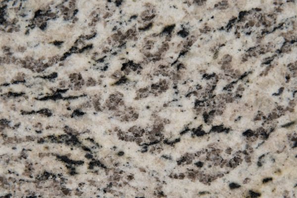 Blanco Perla Granite countertop featuring soft whites, subtle greys, and intricate black specks