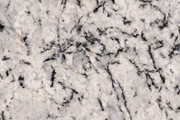 Blizzard Granite countertop featuring crisp white with bold black veins and subtle grey highlights