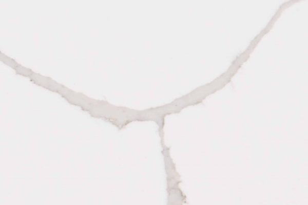 Calacatta Classique Quartz countertop with clean white background and bold grey veins