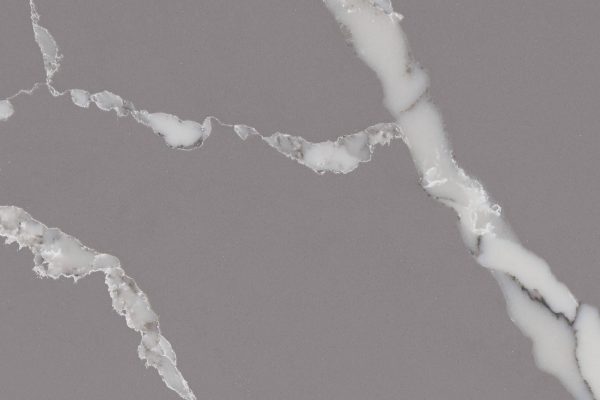 Calacatta Laza Grigio Quartz countertop with grey background and dramatic white veins
