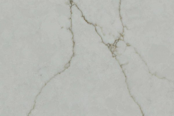Calacatta Valentin Quartz countertop featuring warm white background with detailed gold-brown veins