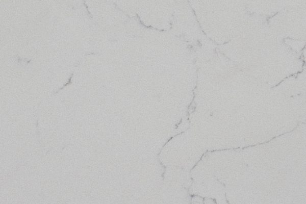 Carrara Delphi Quartz countertop featuring soft grey background and delicate grey veins