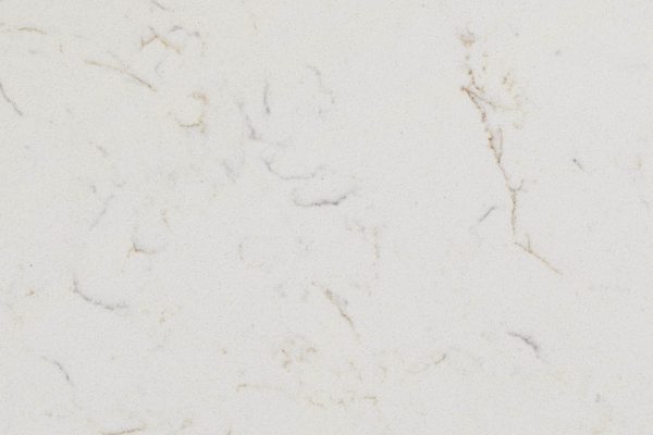 Carrara Miksa Quartz countertop featuring ivory background with subtle grey and gold veining