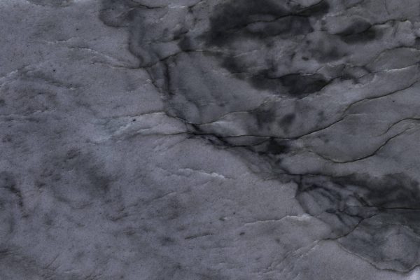Cirrus Gray Quartzite countertop featuring deep grey tones with swirling patterns