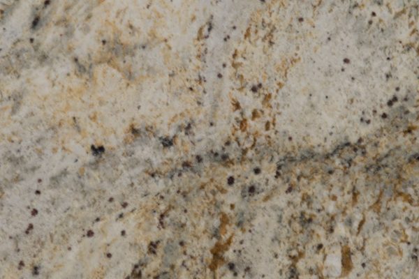 Colonial Cream Granite countertop featuring soft creams, warm golds, and subtle grey veins