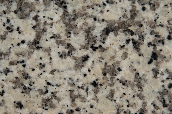 Crema Atlantico Granite countertop featuring warm beige tones with subtle brown and grey specks
