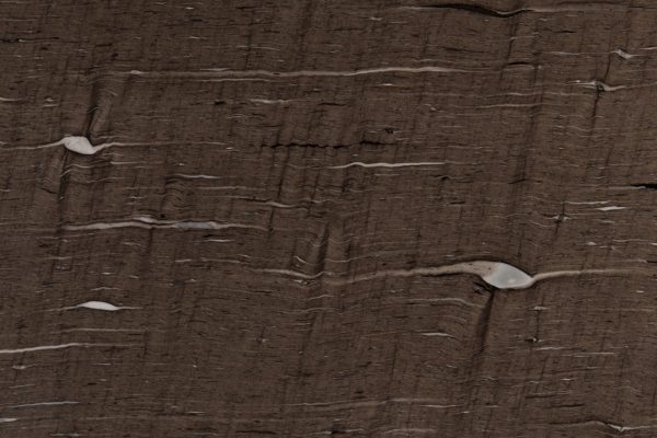 Cygnus Granite countertop featuring deep rich brown tones with elegant lighter streaks