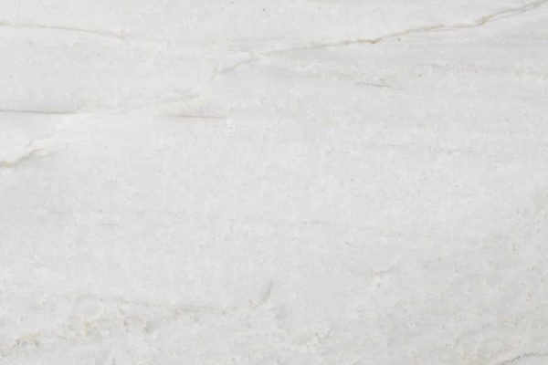 Denali Primary Quartzite countertop showcasing soft white and grey tones with subtle flowing patterns