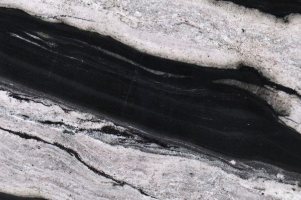 Eclipse Granite countertop showcasing bold black and white wave-like patterns