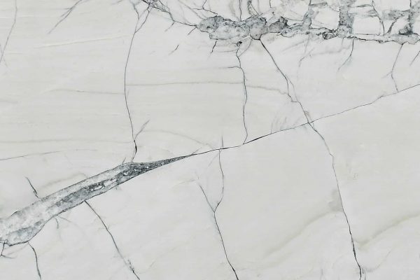Fantasy Montreal Quartzite countertop featuring white background with dramatic grey veining