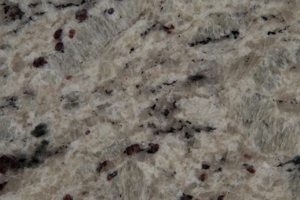 Giallo Fiesta Granite countertop showcasing warm golden hues with subtle grey and brown accents