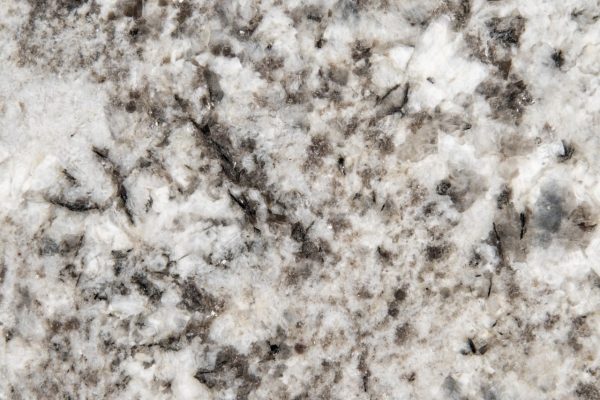 Mirage White Granite countertop featuring dynamic white, grey, and black patterns