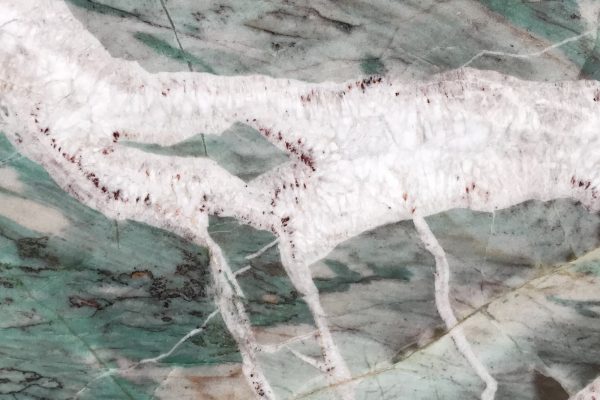 Patagonia Green Quartzite countertop showcasing vibrant green hues with striking white and earthy veins