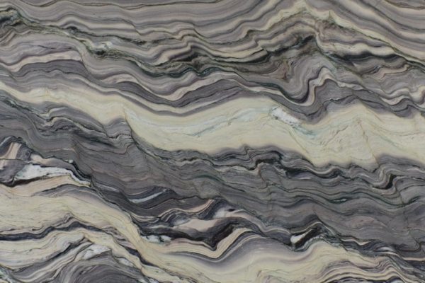 Platinum Blue Quartzite countertop featuring vibrant blue, grey, and cream swirling patterns