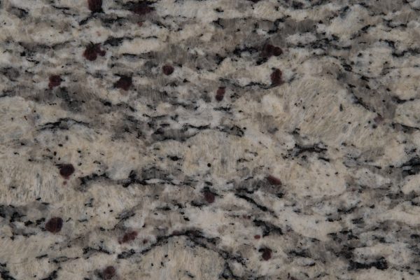 Santa Cecilia LC Granite countertop featuring warm beige tones with rich grey and black specks