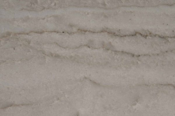 Sea Pearl Quartzite countertop featuring soft white, cream, and subtle grey tones