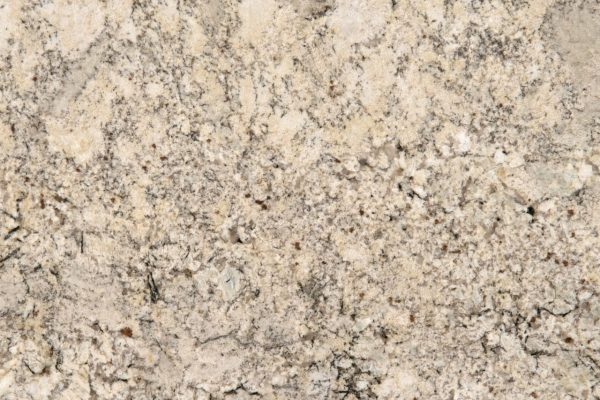 Snowfall Granite countertop featuring a delicate blend of white, cream, and beige tones