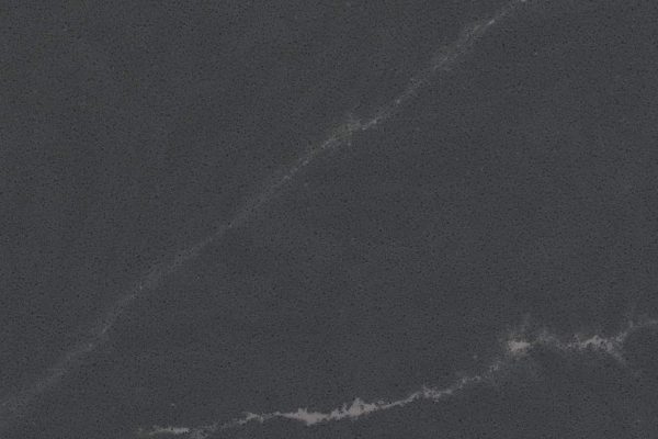 Soapstone Metropolis Concrete Quartz countertop featuring dark grey with bold white veins