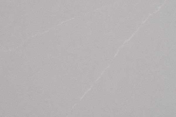 Soapstone Mist Quartz countertop with muted grey surface and delicate white veins