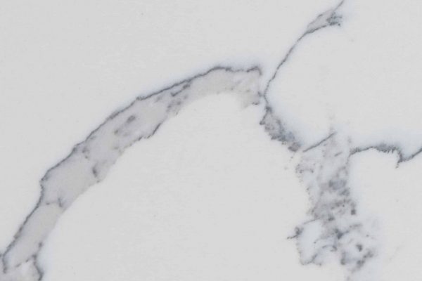 Statuary Classique Quartz countertop featuring white surface with bold grey veins