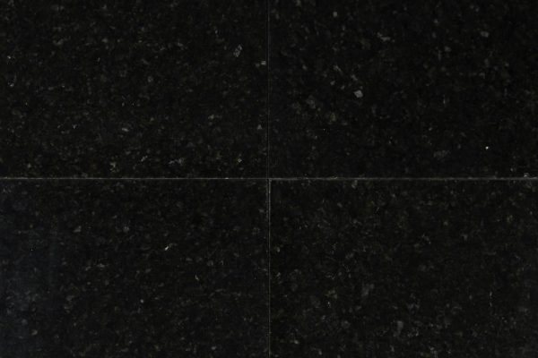 Tubatuba Granite countertop featuring deep black with subtle gold and green flecks