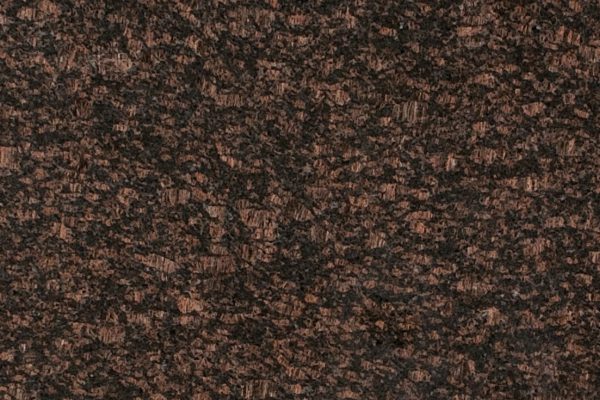 Tan Brown Granite countertop featuring deep brown hues with subtle black and grey accents