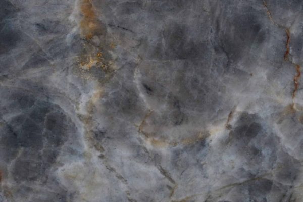 Tempest Blue Quartzite countertop with deep blue, grey, and subtle gold patterns