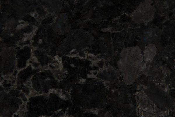 Volga Blue Granite countertop featuring deep black and blue tones with striking iridescent accents