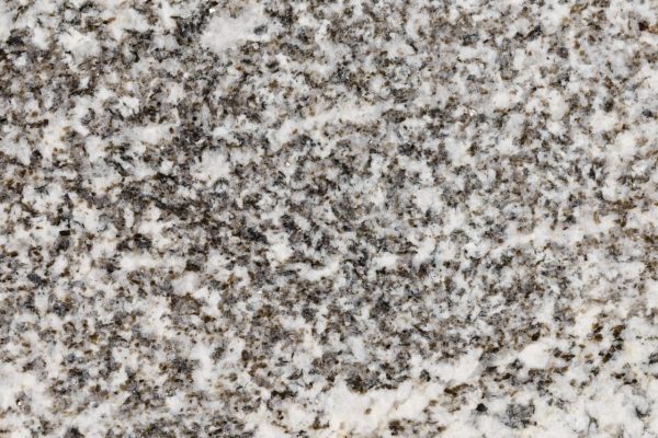 Whisper White Granite countertop featuring soft white and grey tones with gentle black accents