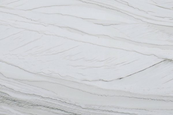 White Macaubas Quartzite countertop featuring pristine white surfaces with elegant grey veining