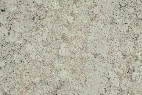 White Supreme Granite countertop featuring subtle white, cream, and grey tones with gentle veining